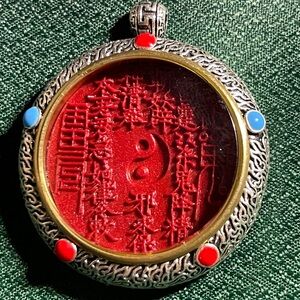Detailed Cinnabar pendant with Ying Yang and Blessings.